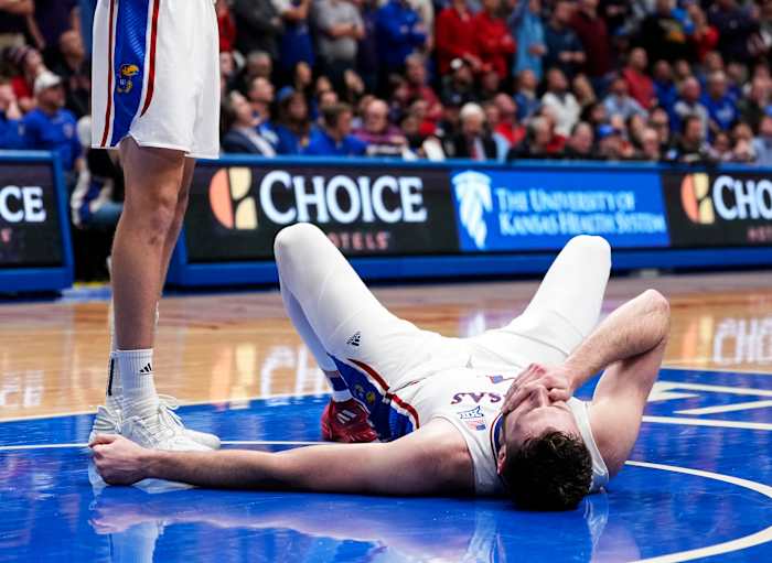 Jan 6, 2024; Lawrence, Kansas, USA; Kansas Jayhawks center Hunter Dickinson (1) reacts after a flagrant foul during the second half against the TCU Horned Frogs at Allen Fieldhouse. Mandatory Credit: Jay Biggerstaff-USA TODAY Sports